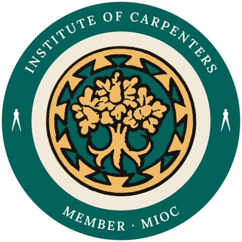 The IOC member seal: the Institute's Badge of an oak on a dovetailed roundel, ringed by the words Institute of Carpenters and Member, with a pair of compasses at each side